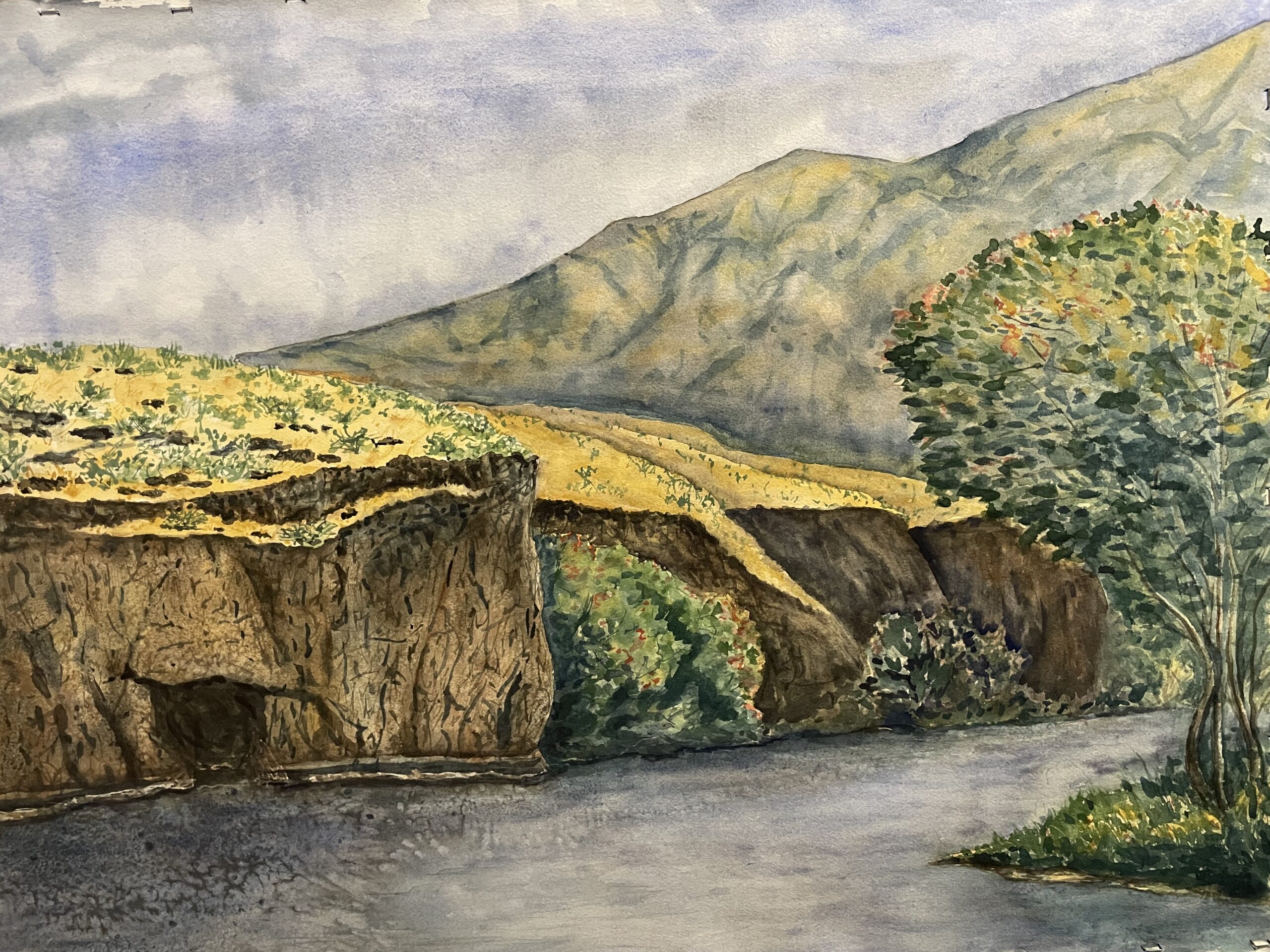 Artwork by Geri Ham, watercolor of the Klickitat River Lumuma Creek, yellow and green hills with rivers below.